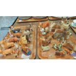 Two trays of mainly ceramic and composite Corgi dog figurines, some by Coopercraft, two brass dogs