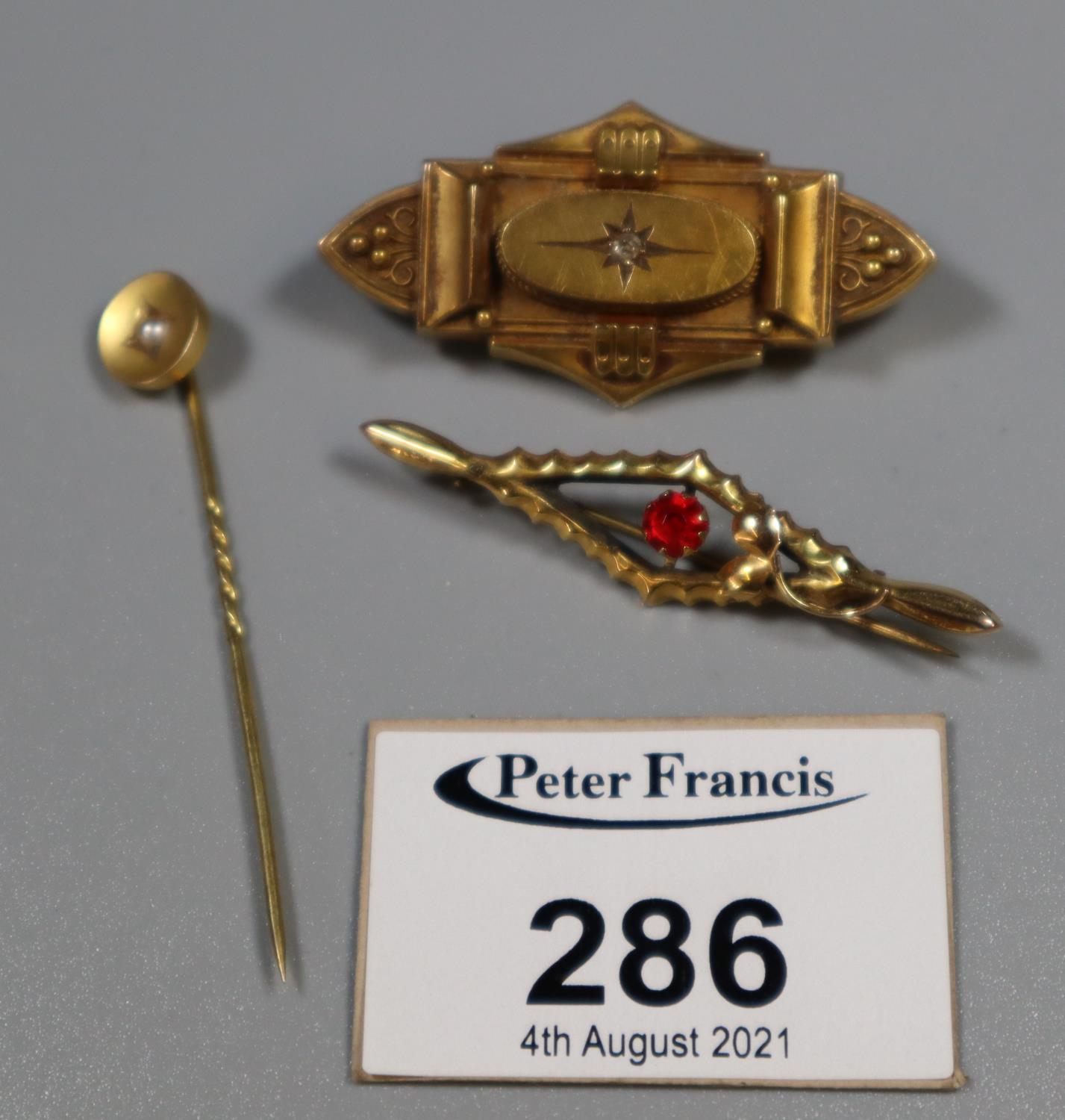 A Victorian 15ct gold diamond set brooch and a 9ct gold bar brooch. Approx weight 6.4 grams. (B.P.