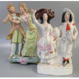Late Staffordshire pottery flat backed figure group, together with a 20th Century continental