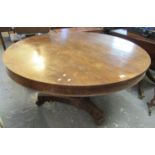 19th Century rosewood centre table on triform base, scroll feet and casters. (B.P. 21% + VAT)
