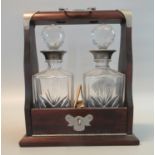 Reproduction mahogany two section glass tantalus with key. (B.P. 21% + VAT)