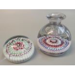 Two multi-coloured cane art glass paperweights, both with pontil marks. (2) (B.P. 21% + VAT)