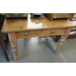 Victorian pine two drawer kitchen table on turned legs. 108 x 74 x 72cm approx. (B.P. 21% + VAT)