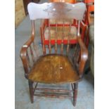 Early 20th Century stained oak spindle back bentwood elbow chair. (B.P. 21% + VAT)