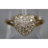 18ct gold diamond encrusted heart ring. Ring size N&1/2. Approx weight 3.4 grams. (B.P. 21% + VAT)