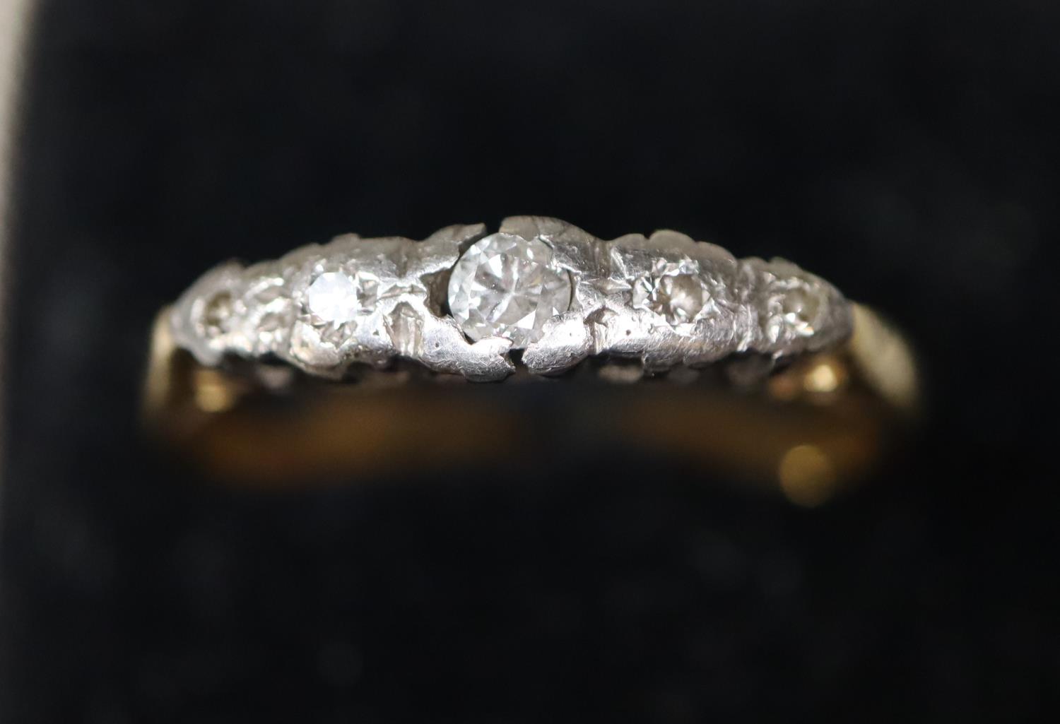 18ct gold five stone diamond ring. Ring size N. Approx weight 2.5 grams. (Setting split). (B.P.