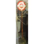 Vintage enamelled sign, 'Bus Stop request', on metal pedestal and composite base. (B.P. 21% + VAT)