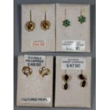 Four pairs of earrings set with citrine, garnet, diamond and pearl. (B.P. 21% + VAT)