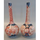 Pair of Japanese porcelain Imari design rosewater type baluster shaped fluted vases overall with