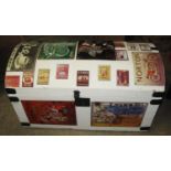 Vintage painted dome top trunk with metal banding and reproduction advertising labels to include;