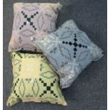 Three woollen Welsh tapestry cushions in different colours. (3) (B.P. 21% + VAT)