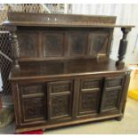 17th Century style carved oak buffet, having carved foliate panelled doors. (B.P. 21% + VAT)