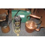 A box containing a copper and brass kettle, a copper cider ladle and a converted Thomas &