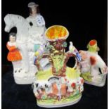 Collection of mainly 19th Century Staffordshire flat back and other spill vases, cows with