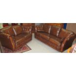 Modern brown leather Chesterfield three seater sofa, together with a matching two seater sofa. (