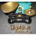 Cast iron and brass set of Boots scales with a selection of weights. (B.P. 21% + VAT)