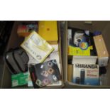 Two boxes of photographic equipment to include: two boxed Miranda lenses in good condition, a