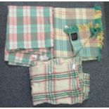 Three vintage woollen check blanket or carthen; two with 'Derw product, made in Wales' labels. (