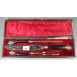 Cased three piece carving set with bone handles and crown terminals. (B.P. 21% + VAT)