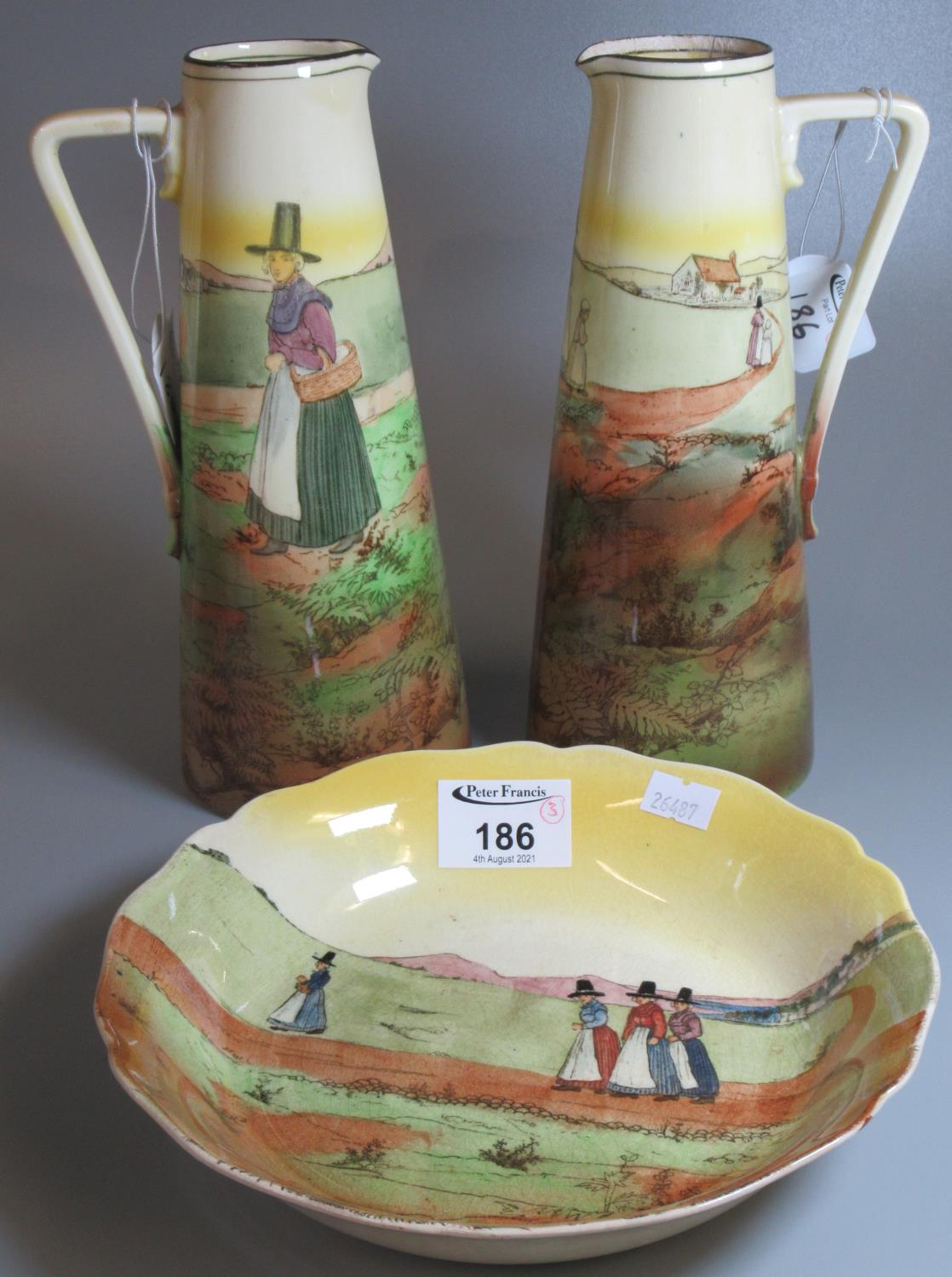 Pair of Royal Doulton Series ware conical jugs of geometric form, transfer printed with Welsh