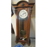 Early 20th Century walnut single train Vienna type wall clock with weight and pendulum. (B.P.