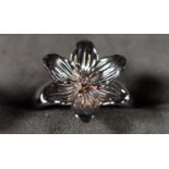 Clogau silver, ?Lady Snowdon? ring with gold accents set with a tiny diamond to the centre. Ring