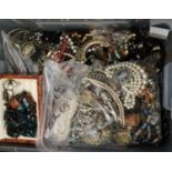 Plastic box of assorted costume jewellery and watches; beads, brooches etc. (B.P. 21% + VAT)