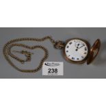 9ct gold half hunter pocket watch. Inner and outer cases all 9ct gold with white enamel face and