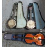 Two vintage banjo mandolins in fitted box, unnamed, together with a student violin in fitted case.