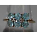 9ct gold double row probably aquamarine dress ring. 2.4g approx. (B.P. 21% + VAT)