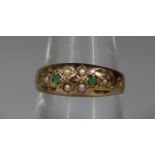 9ct gold Victorian design ring, set with seed pearls and moonstones. 2.4g approx. (B.P. 21% + VAT)