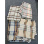 Four vintage check design blankets or carthen in various colours. (4) (B.P. 21% + VAT)