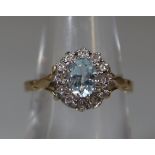 9ct gold step set aquamarine and diamond chip dress ring. 3g approx. (B.P. 21% + VAT)