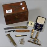 Box of oddments to include pen knives, order of Saint John priory for Wales silver fob, desk seal,