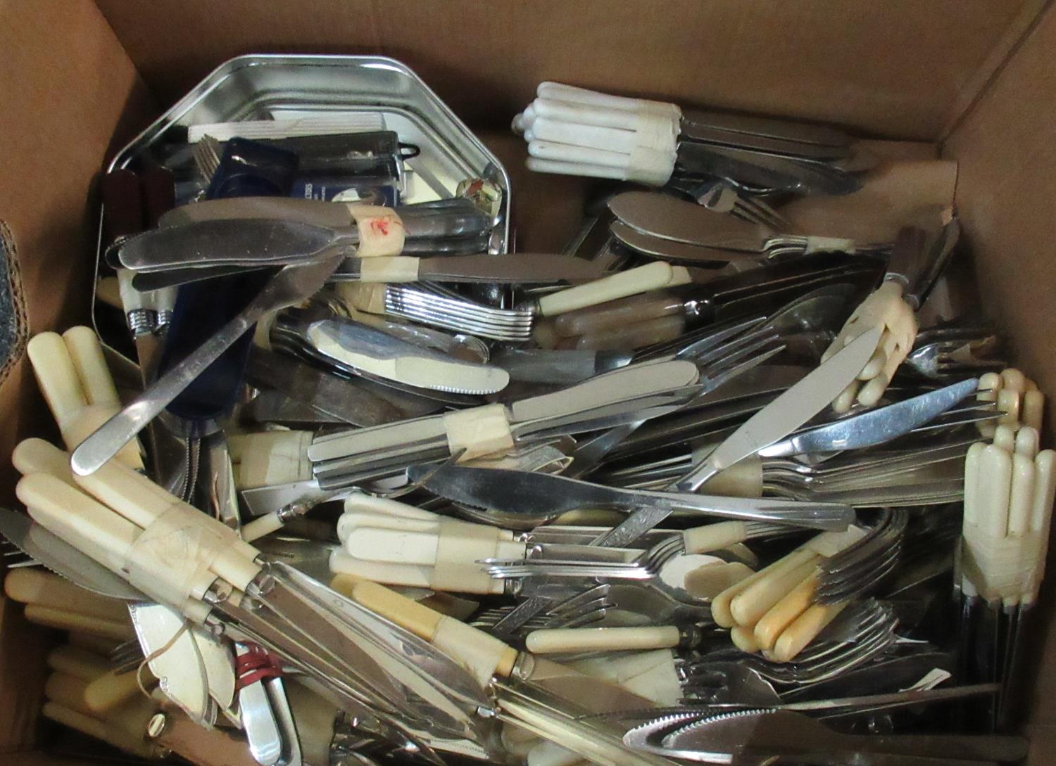Large collection of loose cutlery including; fish knives, butter knives, forks, teaspoons etc. (B.P.