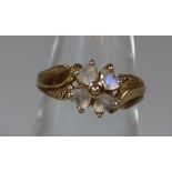 9ct gold mid century flower head design dress ring, set with pale pink stones. 3g approx. (B.P.