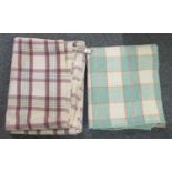 Two vintage woollen check blankets or carthen in different colourways. (2) (B.P. 21% + VAT)