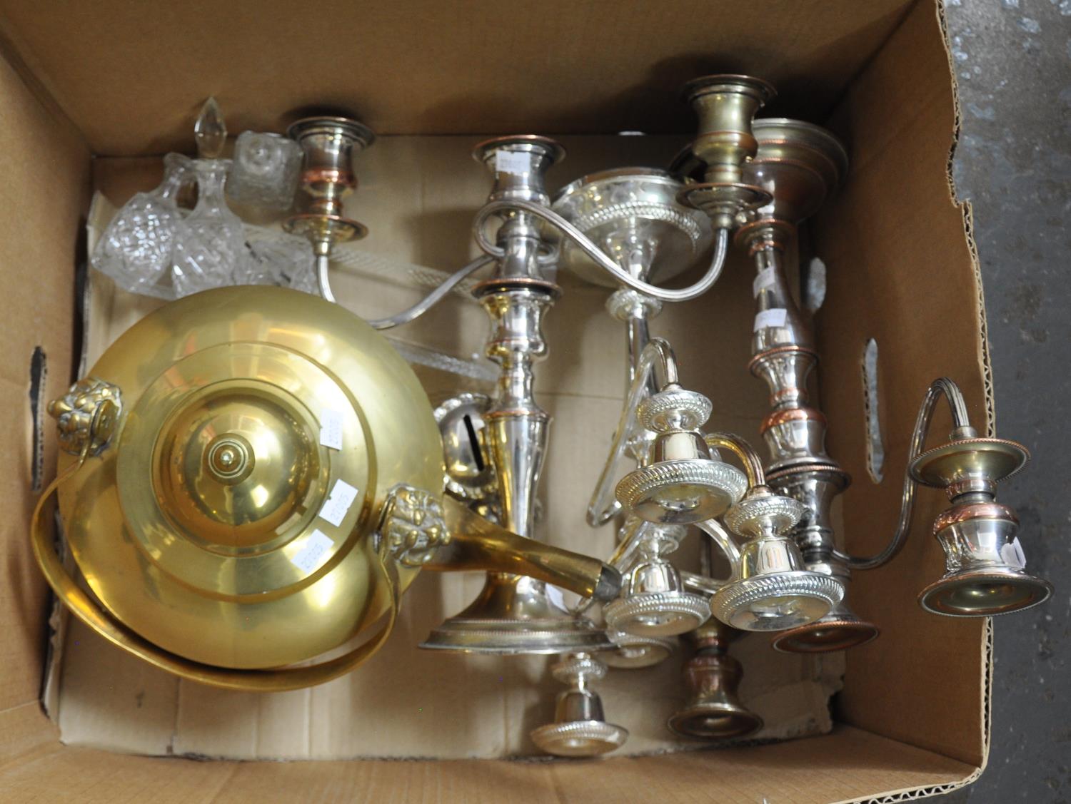 Box containing a pair of elegant silver plate on copper, hand made candelabra, another