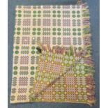 Pale pink ground vintage woollen Welsh tapestry blanket with fringed edges and Derw product made