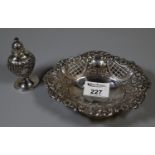 Early 20th Century silver repousse and pierced bon-bon dish on ball feet, together with a similar