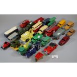 A collection of play worn vintage Dinky toys to include fire engine 555, Bedford truck, heavy