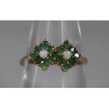 9ct gold dress ring, set with opals and green stones. 2.3g approx. (B.P. 21% + VAT)