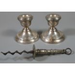 Pair of silver dwarf candle sticks with loaded bases. Birmingham hallmarks. Together with a plated