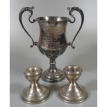 Pair of silver dwarf candlesticks with Birmingham hallmarks, together with a silver plated two