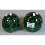 Two Victorian green glass dump paperweights. (2) (B.P. 21% + VAT)