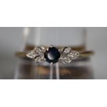 9ct gold sapphire and diamond ring. Ring size W. Approx weight 1.6 grams. (B.P. 21% + VAT)