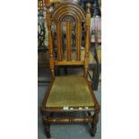 17th century style Liberty & Co Lochleven oak high and curved back chair