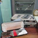 Three cased sets of knives, two modern in briefcases to include; Berghaus and Maybach, and a vintage