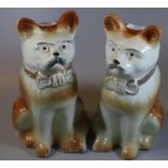 Pair of Staffordshire pottery fireside seated cats with bows and painted features. (B.P. 21% + VAT)