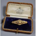 9ct gold bar brooch set with sapphires and diamond. Approx weight 1.7 grams. (B.P. 21% + VAT)